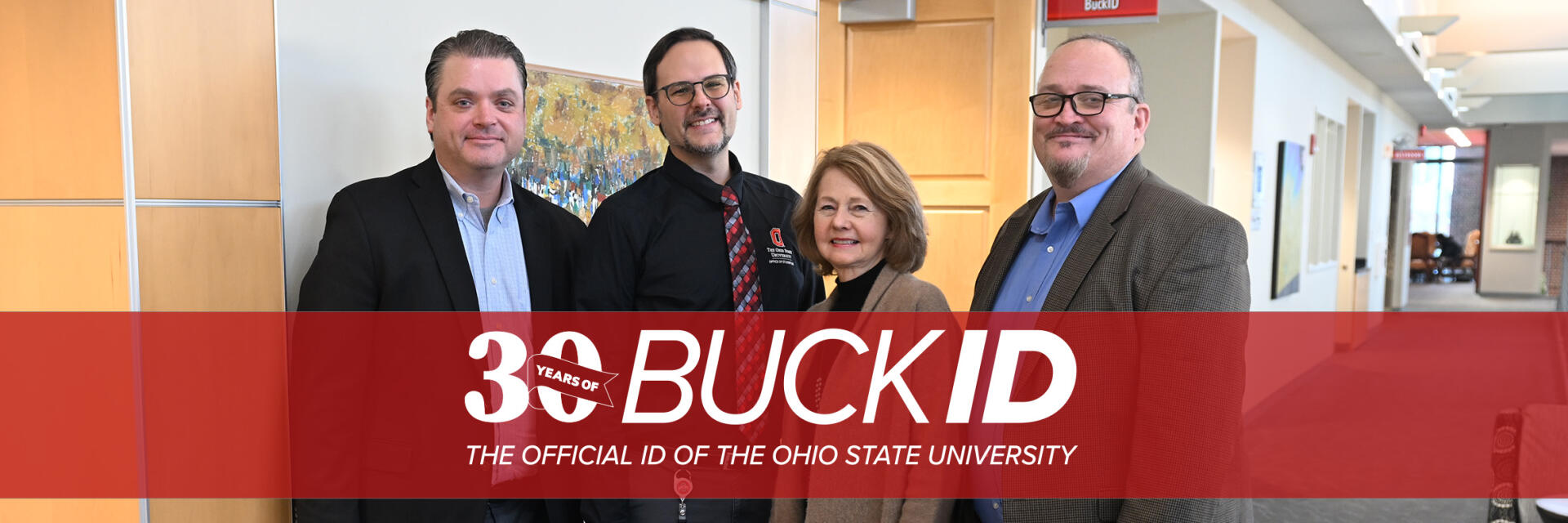Past and Present Directors of BuckID standing in front of the BuckID Office