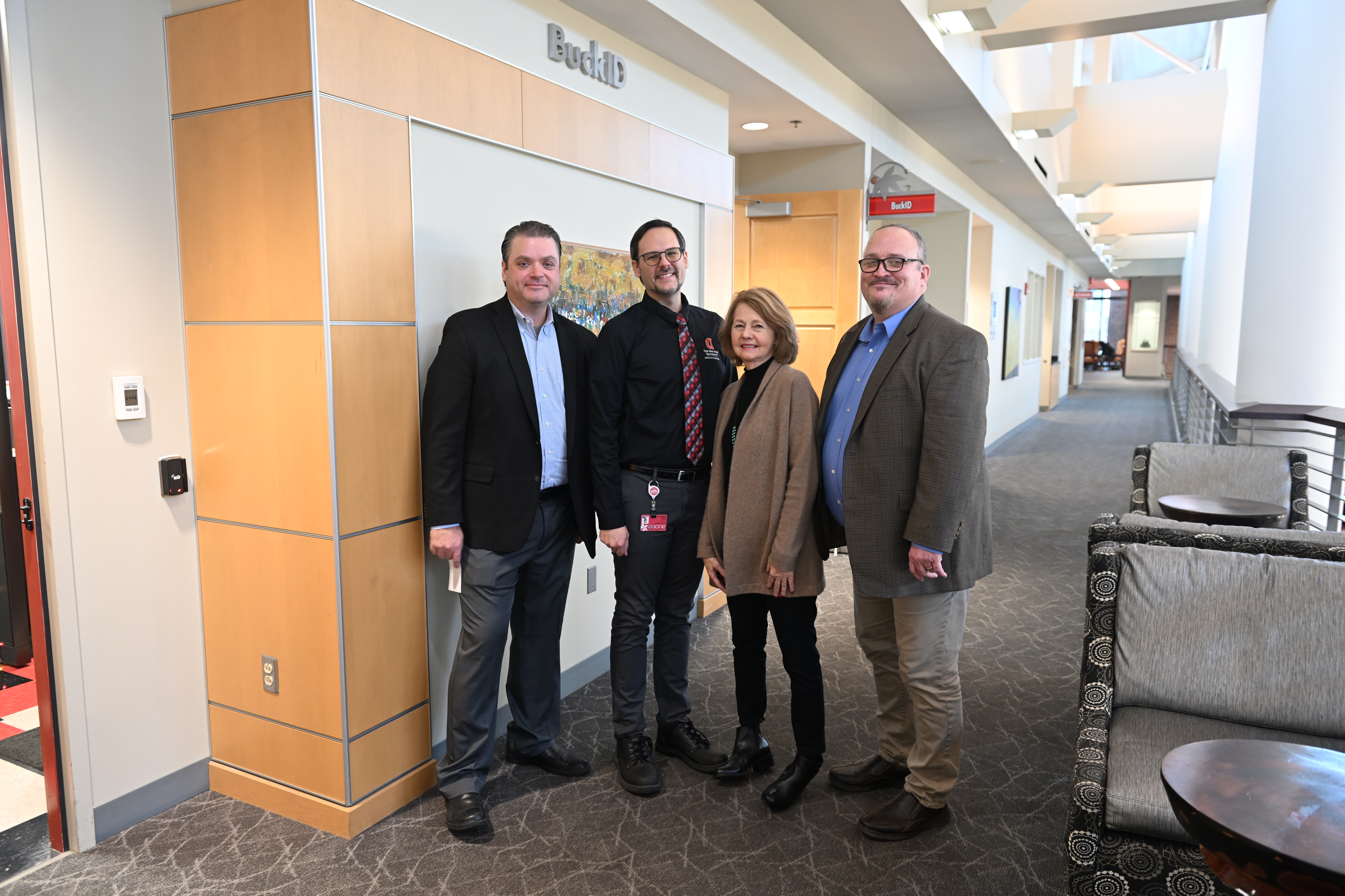 Group photo of the 4 people that have served as Directors of the BuckID Office