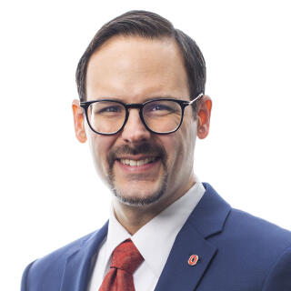 Professional photo of Josh Bodnar, Director of BuckID